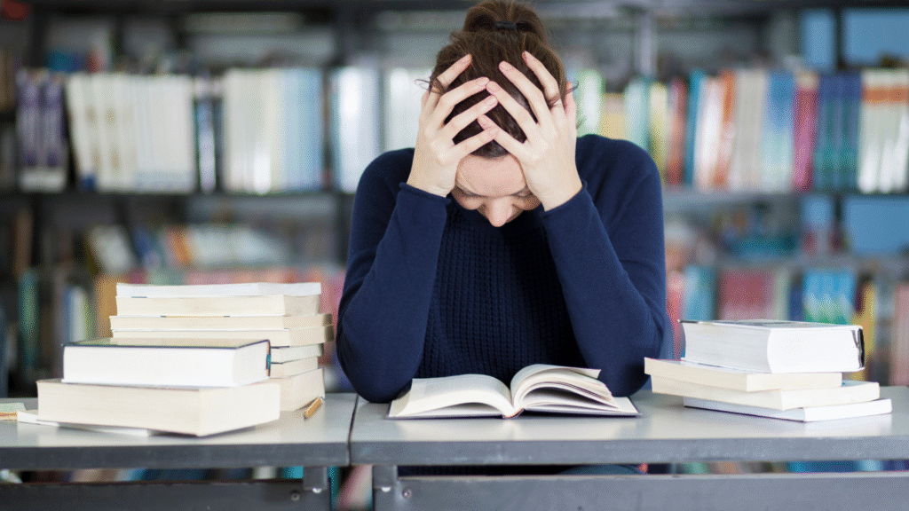 overwhelmed female college student