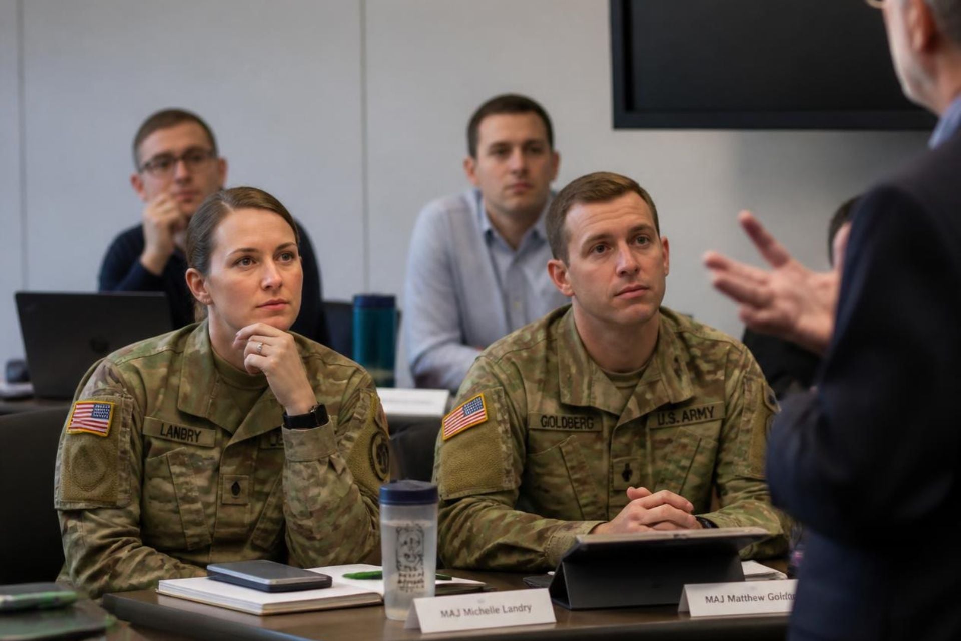 veterans as grad school students listening intently to discussions